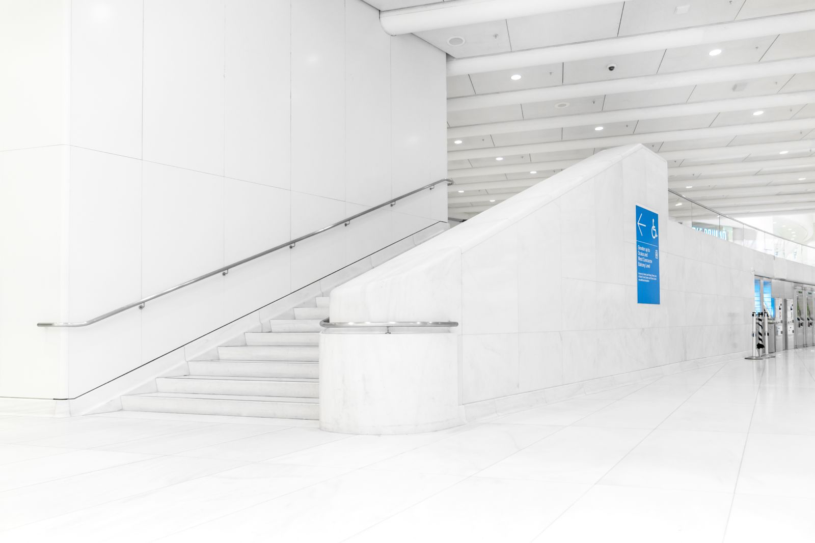 Wall cladding in Lasa marble at the World Trade Center New York with three-dimensional stone elements and massive stair treads